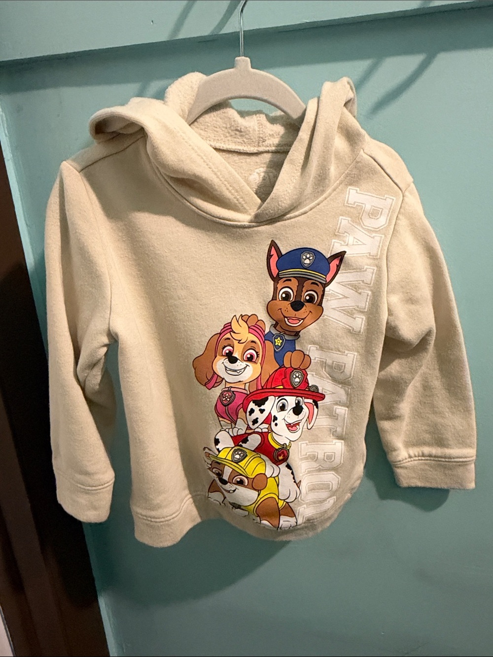 Paw Patrol Cream Hoodie with Colorful Character Graphic